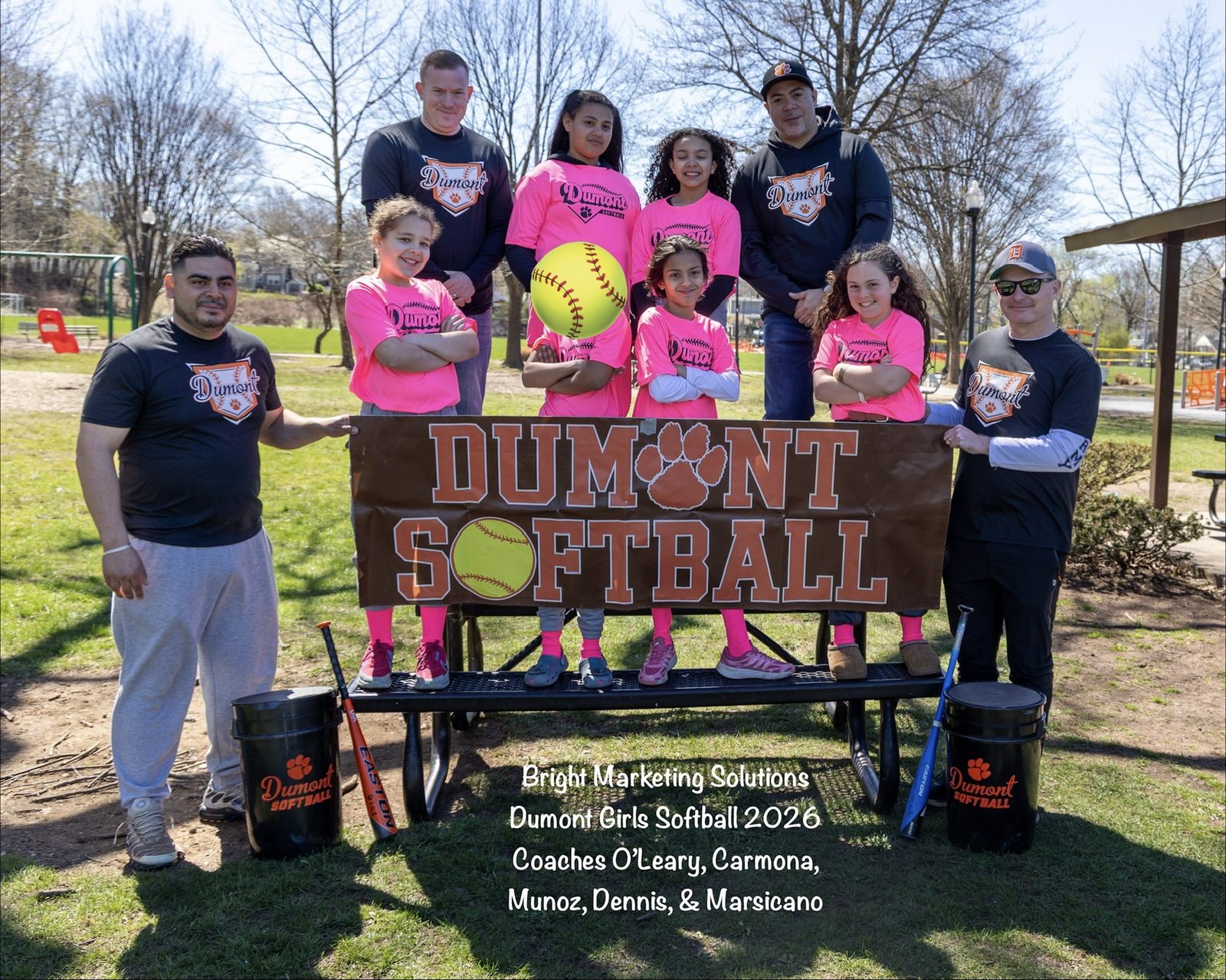 Dumont Girls Softball 2026 team and coaches, sponsored by Bright Marketing Solutions